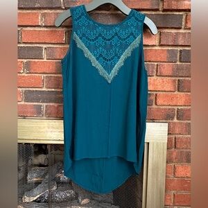 #7)  eyeshadow high low sleeveless top.excellent condition.